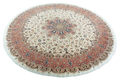 Corner detail of 2000s Tabriz 50/60/70 Raj rug showing border pattern and Cork pile