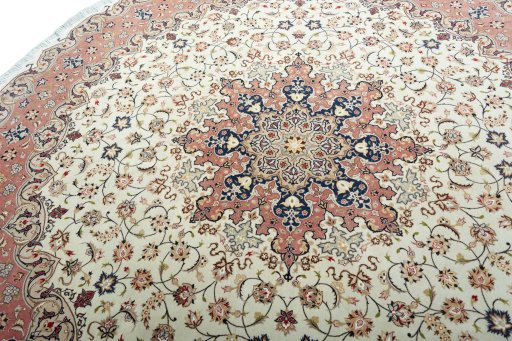 Backside of handmade 2000s Tabriz 50/60/70 Raj rug showing knot structure and weave density