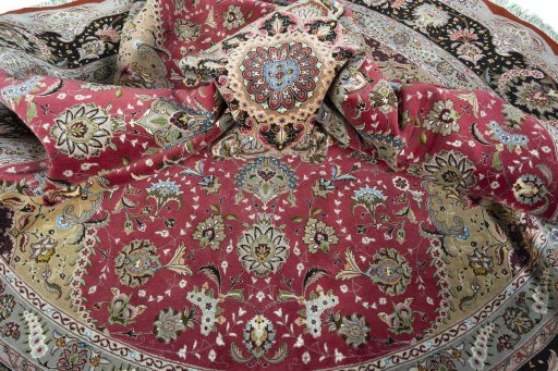 Corner detail of New Tabriz 50/60/70 Raj rug showing border pattern and Cork pile