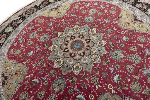 Backside of handmade New Tabriz 50/60/70 Raj rug showing knot structure and weave density