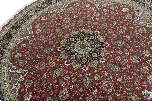 Backside of handmade New Tabriz 50/60/70 Raj rug showing knot structure and weave density