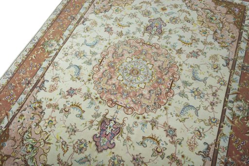 Backside of handmade 2000s Tabriz 50/60/70 Raj rug showing knot structure and weave density