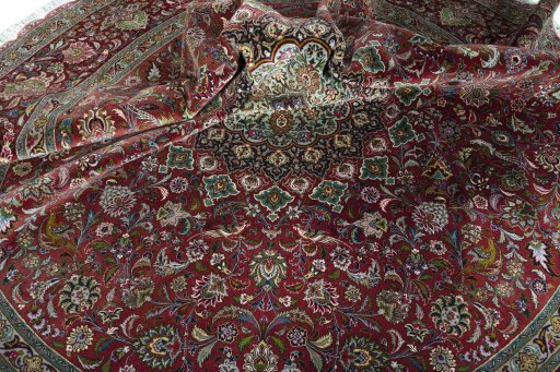 Corner detail of New Tabriz 50/60/70 Raj rug showing border pattern and Cork pile