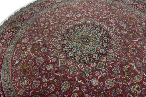 Backside of handmade New Tabriz 50/60/70 Raj rug showing knot structure and weave density