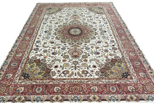 Surface texture of 2000s Tabriz 50/60/70 Raj rug with natural Cork and intricate pattern