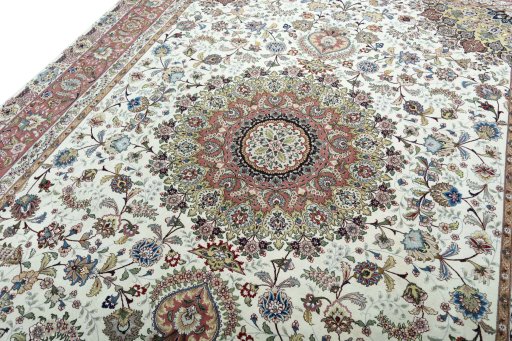 Backside of handmade 2000s Tabriz 50/60/70 Raj rug showing knot structure and weave density