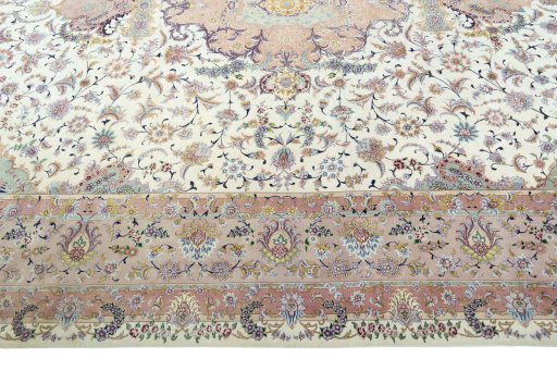 Corner detail of 2000s Tabriz 50/60/70 Raj rug showing border pattern and Cork pile