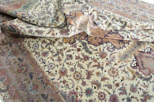 Surface texture of 2000s Tabriz 50/60/70 Raj rug with natural Cork and intricate pattern