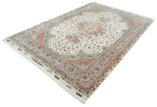 Corner detail of 2000s Tabriz 50/60/70 Raj rug showing border pattern and Cork pile