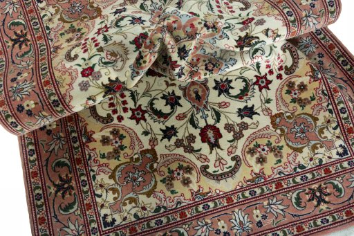Surface texture of 2000s Tabriz 50/60/70 Raj rug with natural Cork and intricate pattern