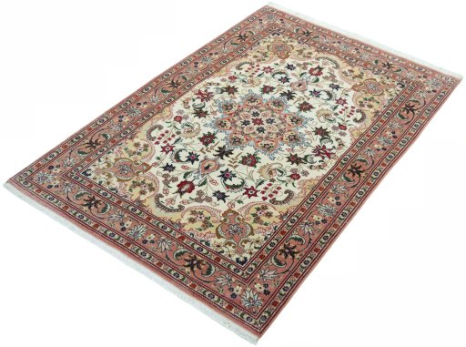 Corner detail of 2000s Tabriz 50/60/70 Raj rug showing border pattern and Cork pile