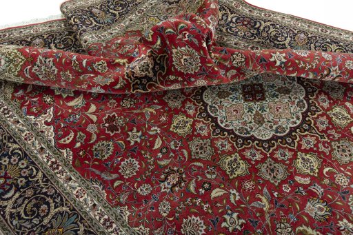 Surface texture of 2000s Tabriz 50/60/70 Raj rug with natural Cork and intricate pattern
