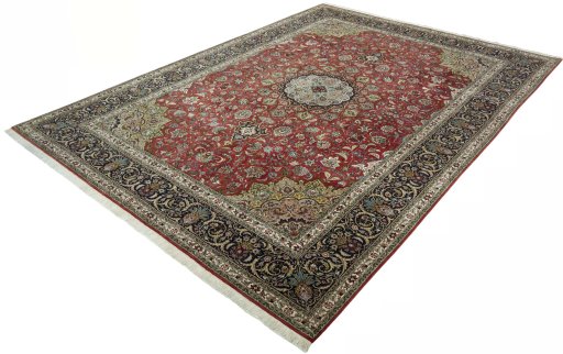 Corner detail of 2000s Tabriz 50/60/70 Raj rug showing border pattern and Cork pile