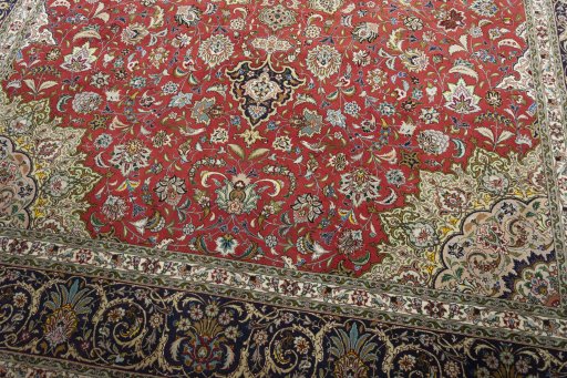 Close-up detail of 2000s Tabriz 50/60/70 Raj rug from Iran / Persia showing Cork weave