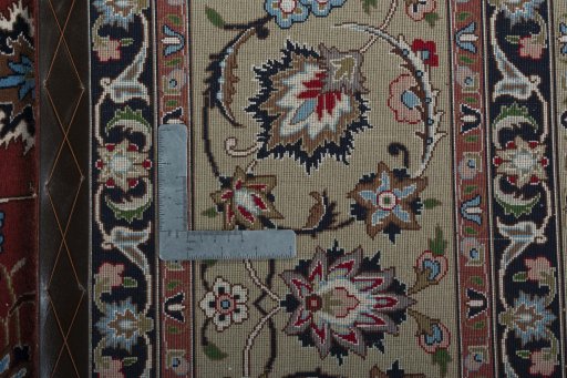 Backside of handmade 2000s Tabriz 50/60/70 Raj rug showing knot structure and weave density