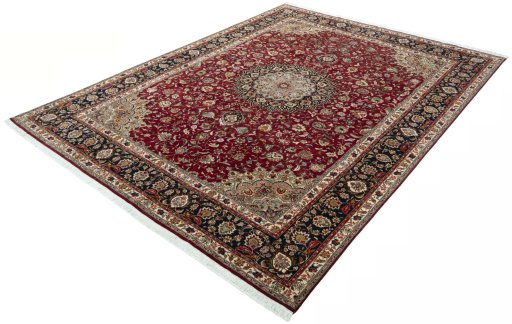Corner detail of 2000s Tabriz 50/60/70 Raj rug showing border pattern and Cork pile