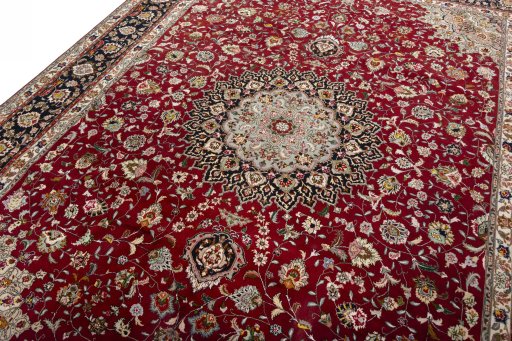 Backside of handmade 2000s Tabriz 50/60/70 Raj rug showing knot structure and weave density