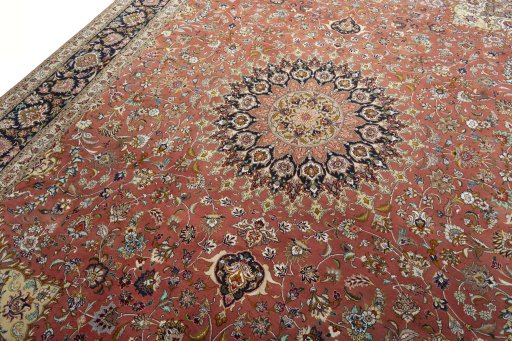 Backside of handmade 2000s Tabriz 50/60/70 Raj rug showing knot structure and weave density