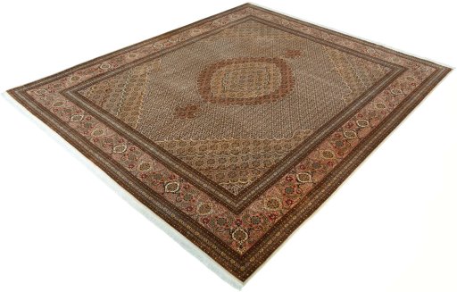 Corner detail of 2000s Tabriz 50/60/70 Raj rug showing border pattern and Cork pile