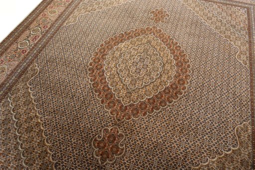 Backside of handmade 2000s Tabriz 50/60/70 Raj rug showing knot structure and weave density