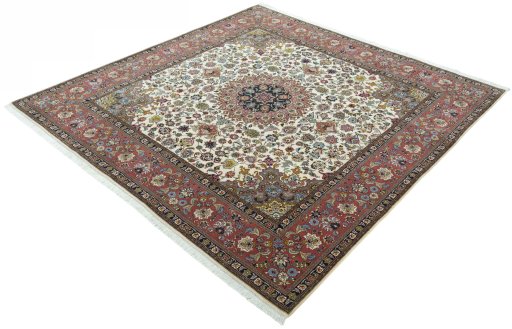 Corner detail of 2000s Tabriz 50/60/70 Raj rug showing border pattern and Cork pile