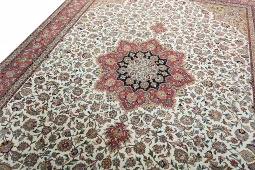 Backside of handmade 2000s Tabriz 50/60/70 Raj rug showing knot structure and weave density