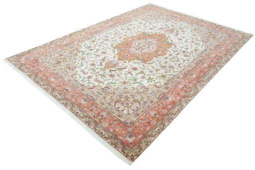 Corner detail of 2000s Tabriz 50/60/70 Raj rug showing border pattern and Cork pile