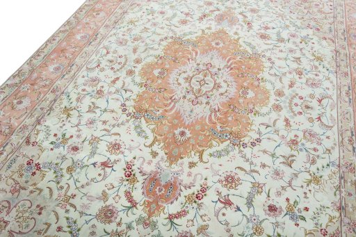 Backside of handmade 2000s Tabriz 50/60/70 Raj rug showing knot structure and weave density