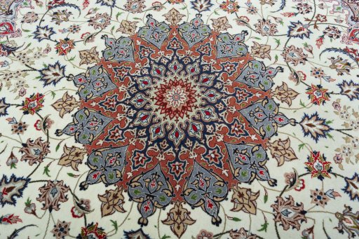 Backside of handmade 2000s Tabriz 50/60/70 Raj rug showing knot structure and weave density