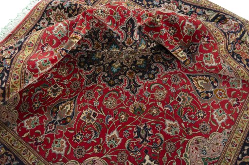 Surface texture of 2000s Tabriz 50/60/70 Raj rug with natural Cork and intricate pattern