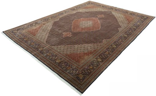 Corner detail of 1970s Tabriz 50/60/70 Raj rug showing border pattern and Cork pile
