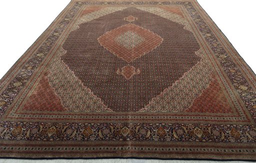 Surface texture of 1970s Tabriz 50/60/70 Raj rug with natural Cork and intricate pattern