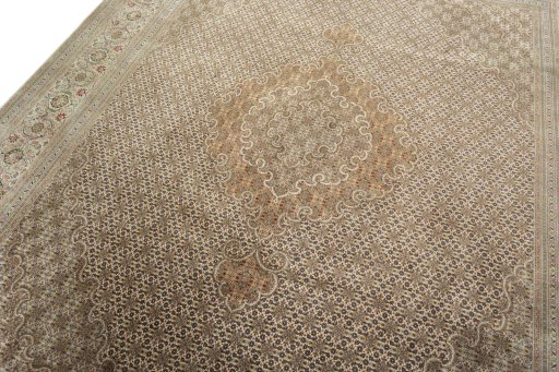 Backside of handmade 2000s Tabriz 50/60/70 Raj rug showing knot structure and weave density