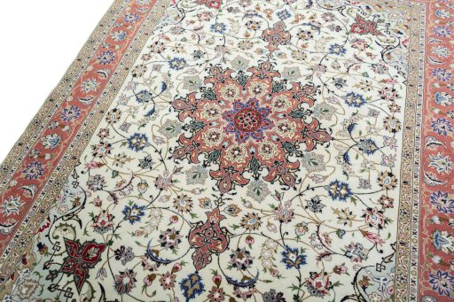 Backside of handmade New Tabriz 50/60/70 Raj rug showing knot structure and weave density
