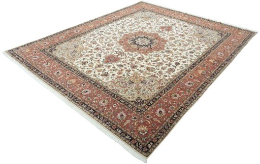 Corner detail of 2000s Tabriz 50/60/70 Raj rug showing border pattern and Cork pile