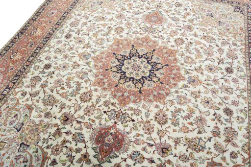 Backside of handmade 2000s Tabriz 50/60/70 Raj rug showing knot structure and weave density
