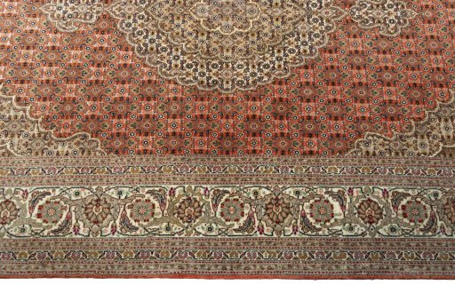 Corner detail of New Tabriz 50/60/70 Raj rug showing border pattern and Cork pile