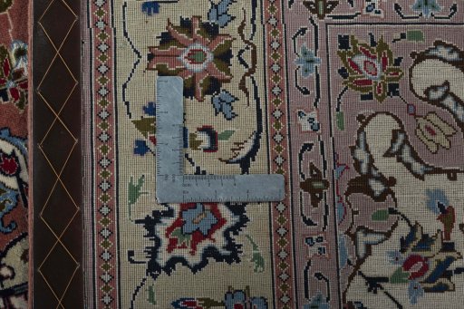 Backside of handmade New Tabriz 50/60/70 Raj rug showing knot structure and weave density