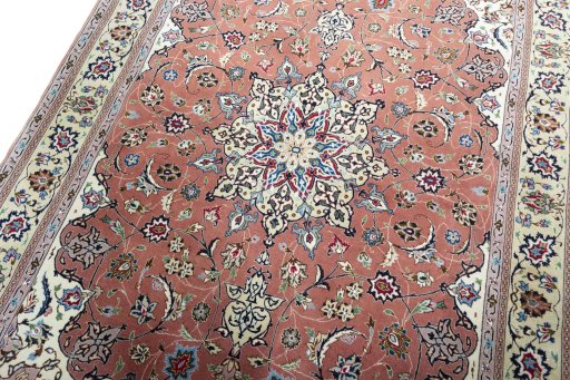 Backside of handmade New Tabriz 50/60/70 Raj rug showing knot structure and weave density