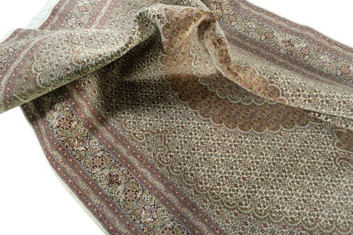 Surface texture of New Tabriz 50/60/70 Raj rug with natural Cork and intricate pattern