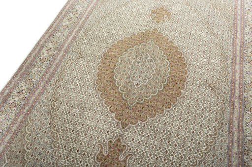 Backside of handmade New Tabriz 50/60/70 Raj rug showing knot structure and weave density
