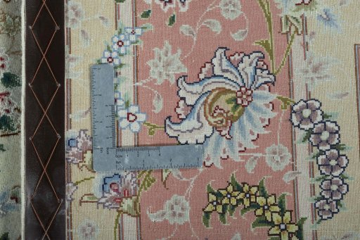 Backside of handmade New Tabriz 50/60/70 Raj rug showing knot structure and weave density