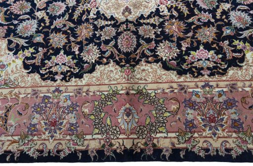 Corner detail of New Tabriz 50/60/70 Raj rug showing border pattern and Cork pile