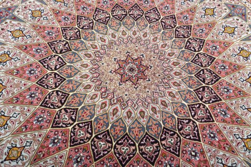 Backside of handmade New Tabriz 50/60/70 Raj rug showing knot structure and weave density