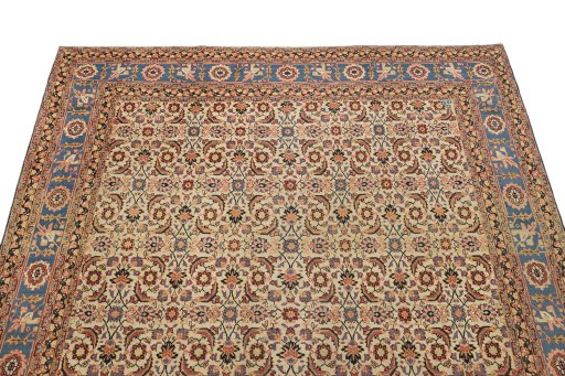Surface texture of 1930s Tabriz Petag rug with natural Wool and intricate pattern