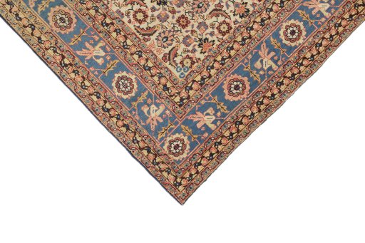 Backside of handmade 1930s Tabriz Petag rug showing knot structure and weave density