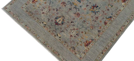 Backside of handmade New Farahan rug showing knot structure and weave density