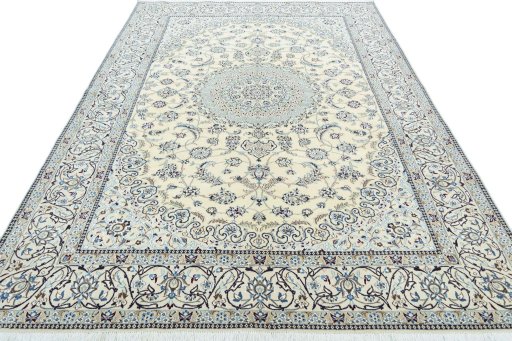 Surface texture of 2000s Nain rug with natural Wool and intricate pattern