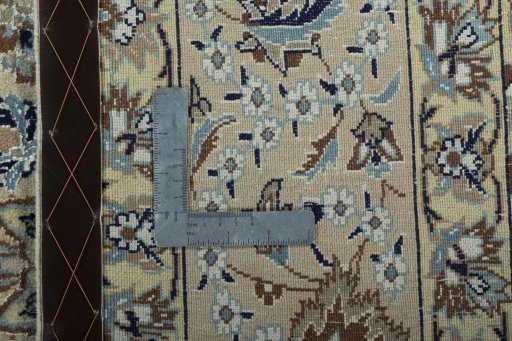 Backside of handmade 2000s Nain rug showing knot structure and weave density