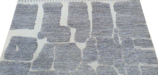 Backside of handmade New Morocco rug showing knot structure and weave density